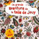 La couverture colorée de XCOMM_LA GRANDE AVENTURE DE LA TOILE DE JOUY est ornée de motifs floraux et d'oiseaux, d'un titre en rouge et blanc, d'un personnage orange de dessin animé, d'un cercle jaune et de la mention "+6 pages de jeux". la marque Toile de Jouy