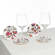 Trois verres à vin ABAT-JOUR SUR COMMANDE reposent chacun sur une petite assiette ronde ornée de motifs floraux et fruitiers colorés, posés sur une surface blanche sur un fond blanc uni. la marque Toile de Jouy